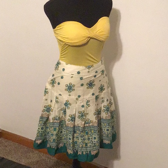green skirt and yellow top
